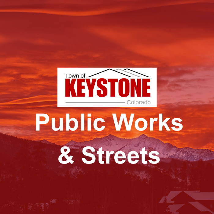 Mountain landscape with a red overlay and text reading Town of Keystone Public Works & Streets.